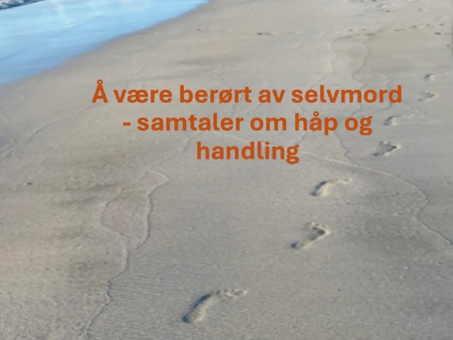 Sandstrand med fotspor