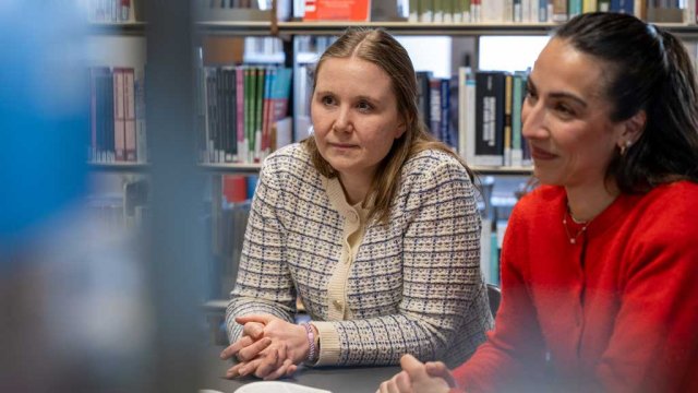 Two women at a library