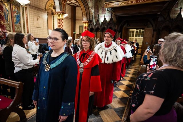 A procession of academics in fancy robes