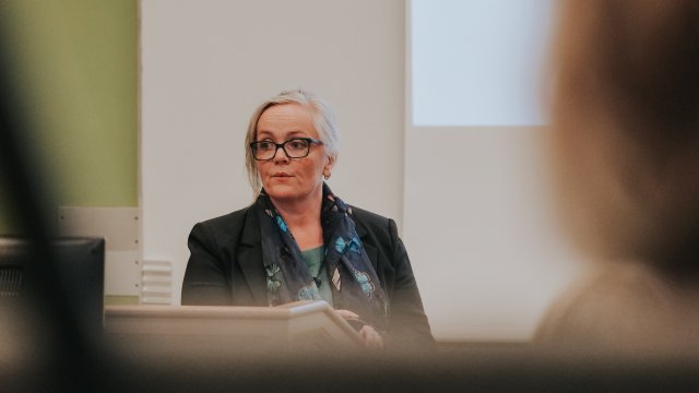 Woman giving a lecture
